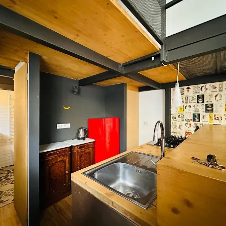 San Salvario Loft: Where Industrial Meets Urban Apartment Turin