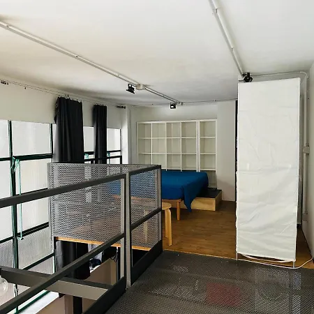 San Salvario Loft: Where Industrial Meets Urban Apartment Turin